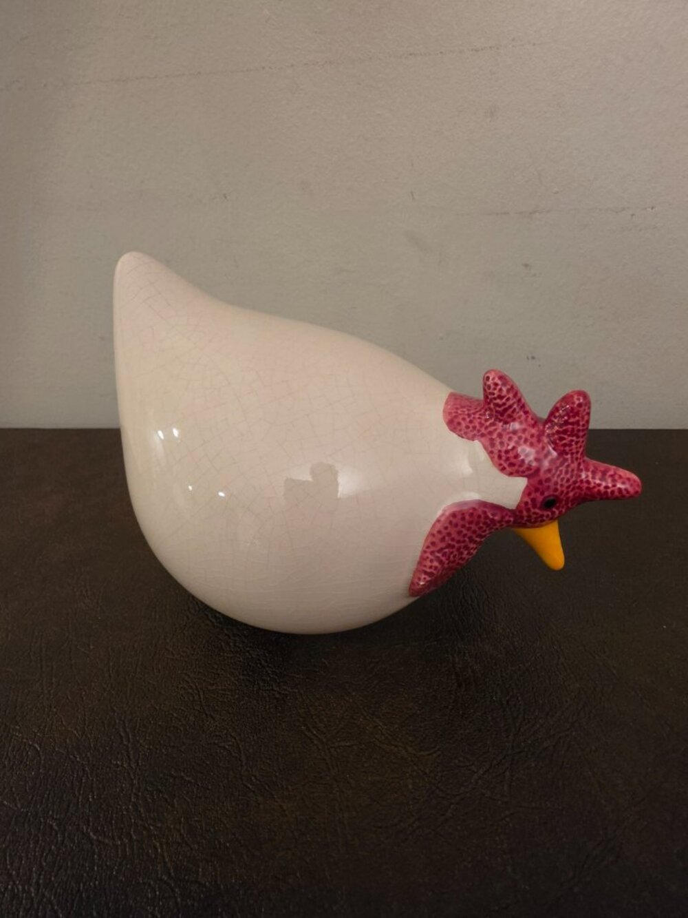 Ceramic chicken hen figurine features a teal crackle style design, hand-painted